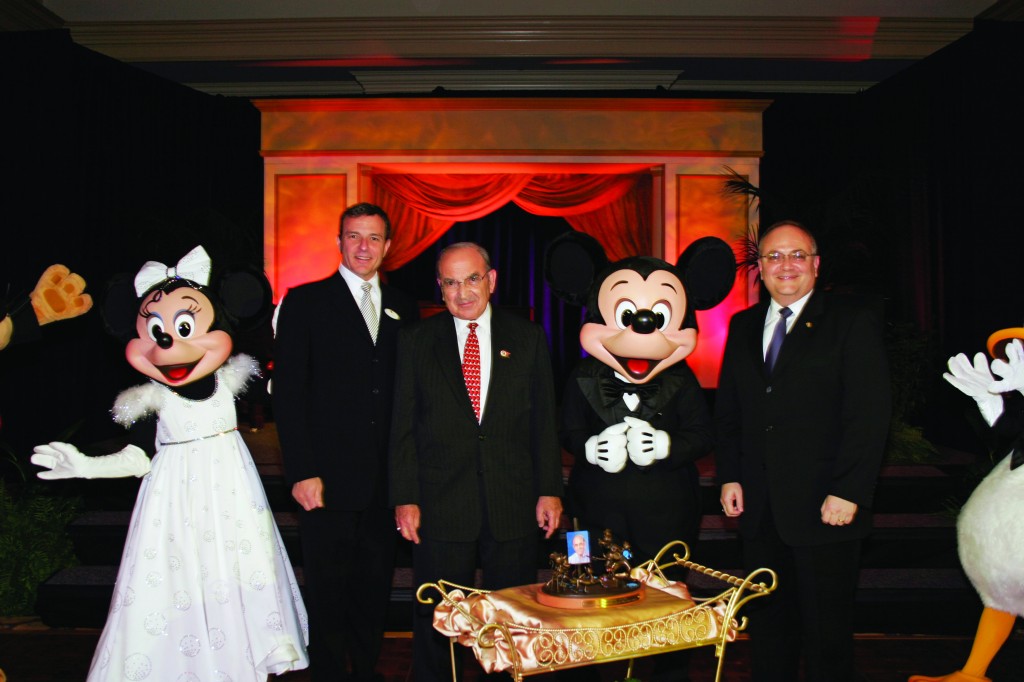 (L to R): Minnie Mouse, Disney CEO Bob Iger, Marty Sklar, Mickey Mouse, and Jay Rassulo (now Disney CFO) celebrate Marty's 50th anniversary with company. Courtesy Marty Sklar.