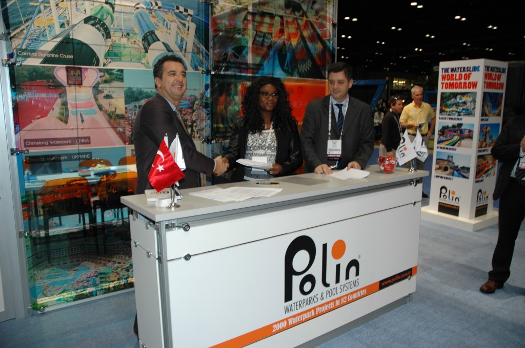 Princess Abiodun Oyefusi, Managing Director for Delta Leisure Resorts, signs agreements with Polin representatives.