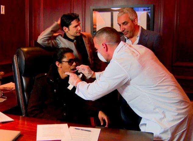 Brandon Howard (getting DNA swab), actor Corey Feldman, Alki David in publicity photo