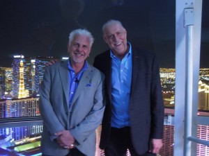 Phil Hettema(R) on one of his newest attractions, the High Roller observation wheel in Las Vegas, with John Kasperowicz (L)