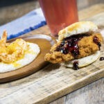 Enjoy southern classics with a twist, including an upgraded chicken biscuit with bourbon blackberry jam