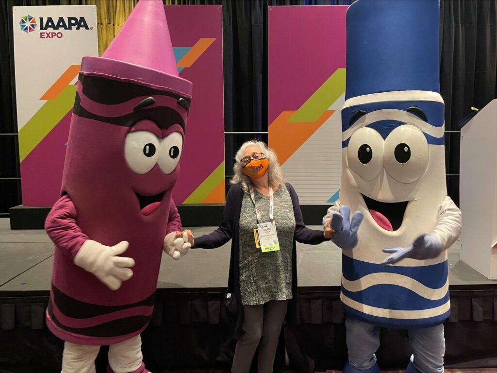Judith Rubin with Crayola characters at 2021 IAAPA Expo, Orlando, Florida